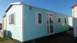 Casa móvil T2 ideal 23,4 m² ancho 3m para parcelas reducidas.